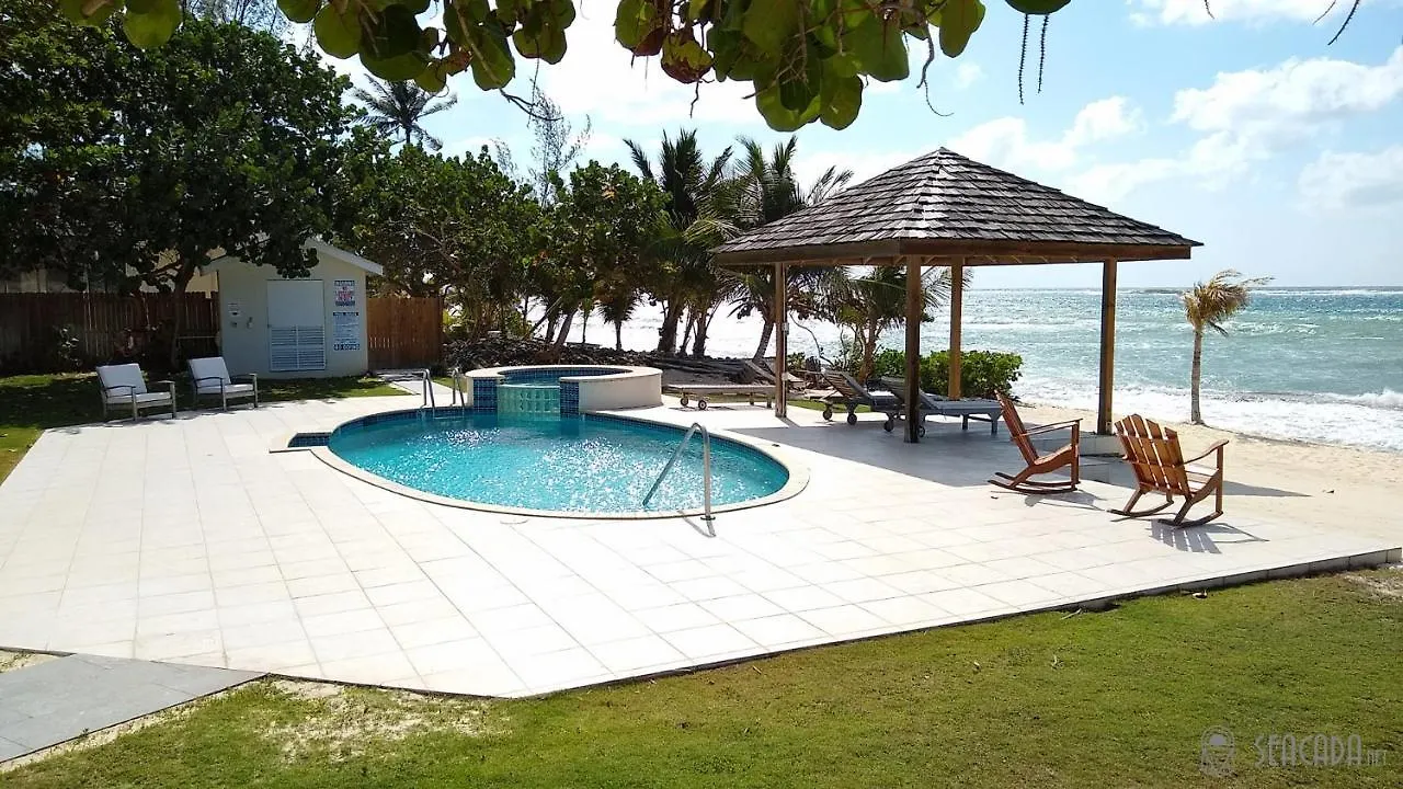 Seacada- Beachfront - Pool - Panoramic Sunsets Apartment George Town