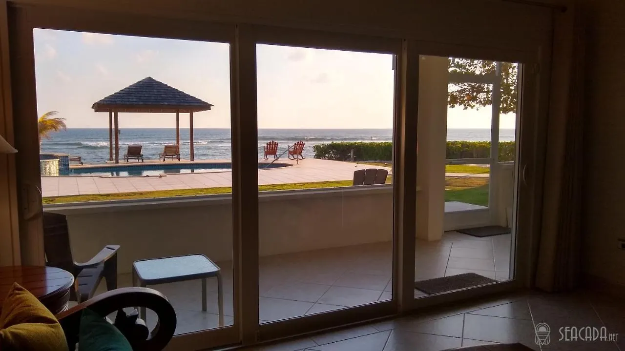 Seacada- Beachfront - Pool - Panoramic Sunsets Apartment George Town